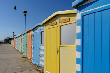 Colourful beach huts in Seaford, East Sussex. 