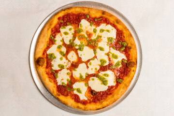 Margherita pizza on a tray