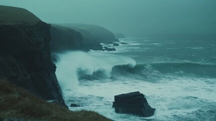 Dramatic coastal waves crashing against rugged cliffs under stormy skies