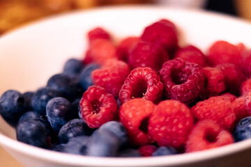 Fresh Raspberries and Blueberries in a White Bowl – Healthy Summer Fruits