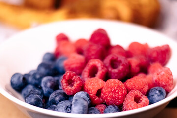 Fresh Raspberries and Blueberries in a White Bowl – Healthy Summer Fruits