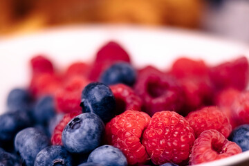 Fresh Raspberries and Blueberries in a White Bowl – Healthy Summer Fruits