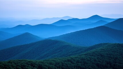 Fototapeta premium A beautiful layered landscape showcasing hills and atmospheric perspective in blue