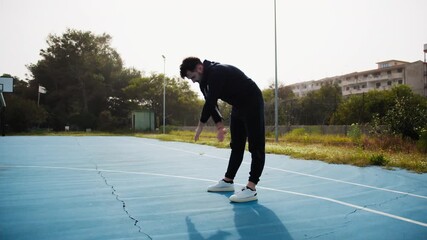 Stretching Before a Basketball Match at the Park