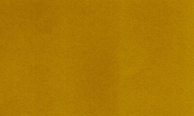 Soft mustard yellow paper texture. Warm and versatile background for graphic design, layout, or creative projects.