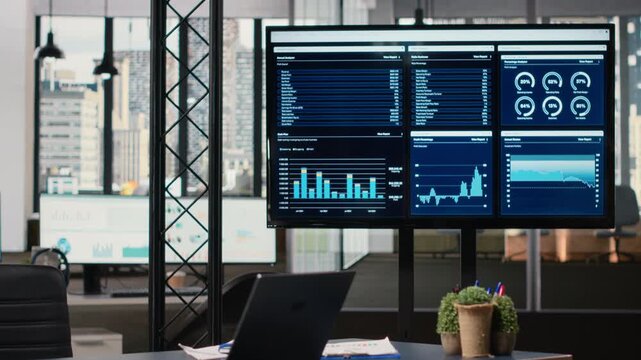 Quiet corporate space equipped with a laptop and performance reports, representing a modern business office ready for data driven decision making, forecasting and strategic analysis.