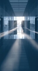 Sunlight streams through a modern corridor