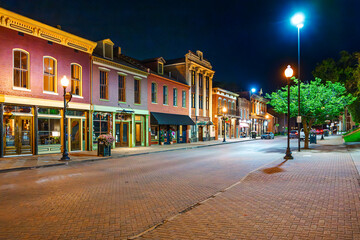 Illuminated nigh view of mid 19th century buildings along the historic brick paved Main Street of St. Charles, Missouri. © Kirk Fisher