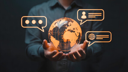 Global communication concept visualized with glowing earth and chat bubbles held in hands
