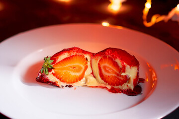 The most romantic sweet in the world, the iconic strawberry dessert with viral love, fresh strawberry, powdered milk brigadeiro and red caramel topping. Morango do amor