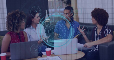 Collaborating coworkers analyzing fingerprint interface in office lounge with laptops, coffee cups