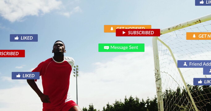 Kicking soccer player wearing red kit near white goal net, with social media icons, copy space