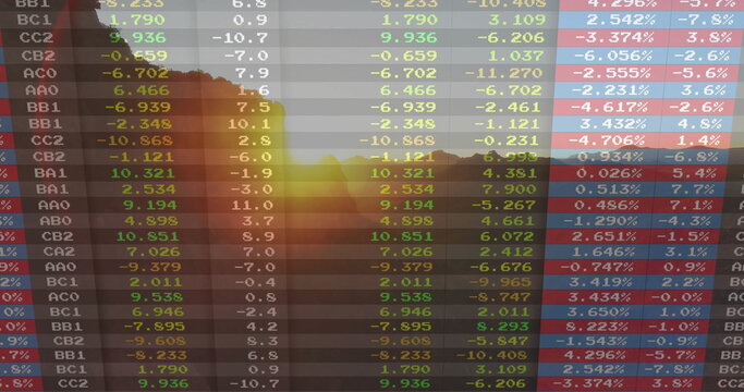 Naklejki Shining sun disk illuminating forested hillside at dawn, with colored digital ticker grid