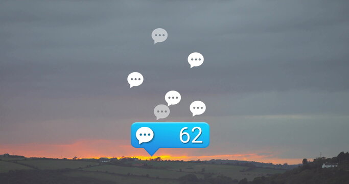 Floating chat bubble icons drifting over fields at sunset, with blue notification badge showing 62