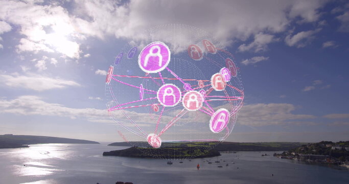 Hovering network globe displaying user icons above coastal bay, with sailboats and harbor town - Powered by Adobe