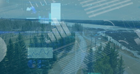 Fototapeta premium Displaying winding paved road cutting through dense conifer forest by lake, with data overlays