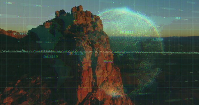 Rugged red sandstone cliff rising at calm sea at sunset, with numeric data grid, holographic globe