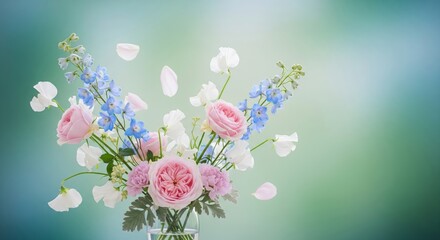 A Beautiful Bouquet of Pink Roses and Blue Delphinium with Delicate White Flowers and Falling Petals Against a Soft Green and Blue Blurred Background Creating a Gentle and Romantic Ambiance