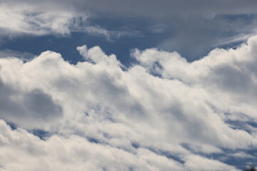 Obraz premium White Clouds Floating in a Blue Sky – Natural Background from Korea