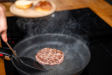 amburger Patty Cooking in Frying Pan – Sizzling Beef Burger
