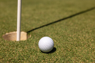 Golf Club and Ball on Green Grass – Outdoor Golf Course Close-Up