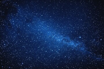 Fototapeta premium Starry sky background, blue night sky full of stars, glowing stars in the dark space, starry background, dark night, stars in the distance, starlight, dark background with a blue glow, night sky. 