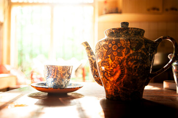 Enjoying morning tea in the kitchen from a vintage teapot in Sri Lanka. 