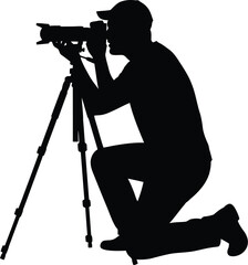 Silhouette of a photographer kneeling with a camera a tripod, capturing images with professional equipment and showcasing the art of photography