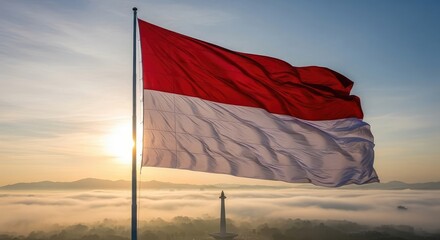 National flag waving over foggy landscape