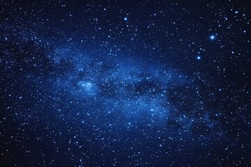 Obraz premium Starry sky background, blue night sky full of stars, glowing stars in the dark space, starry background, dark night, stars in the distance, starlight, dark background with a blue glow, night sky. 