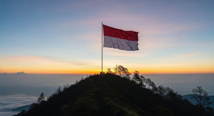 Sunrise flag on mountaintop
