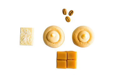 Assortment of sweet treats including cookies caramel squares and small candies isolated on transparent background