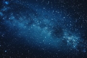 Fototapeta premium Starry sky background, blue night sky full of stars, glowing stars in the dark space, starry background, dark night, stars in the distance, starlight, dark background with a blue glow, night sky. 