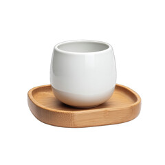 A minimalist white ceramic cup rests on a light brown, softly rounded bamboo coaster.  The cup is short and slightly wider at the top