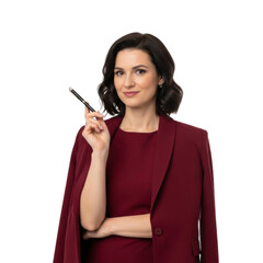 Obraz premium A confident businesswoman in a maroon suit holds a pen, smiling at the camera on a white background.