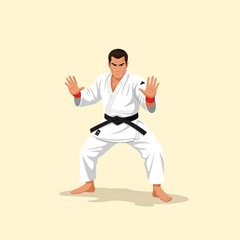 Man in Martial Arts Stance Wearing White Uniform and Black Belt