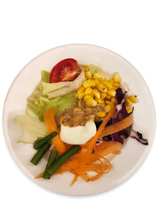 Colorful Fresh Vegetable Salad with Dressing on Plate