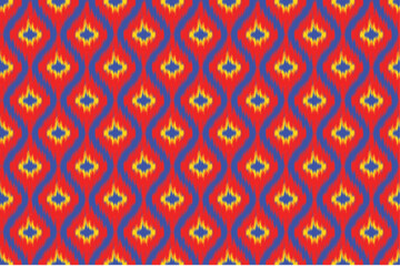 A striking it pattern featuring wavy diamond motifs in vibrant red, yellow, and blue. The bold color contrast and rhythmic flow create a lively, modern ethnic style.