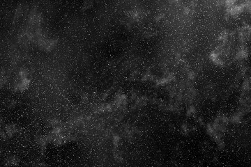 A stunning black and white cosmic landscape filled with stars.