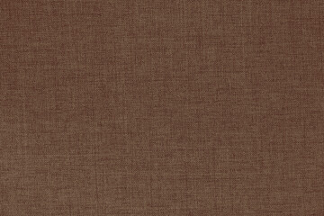 Fototapeta premium Dark brown linen fabric cloth texture for background, natural textile pattern.