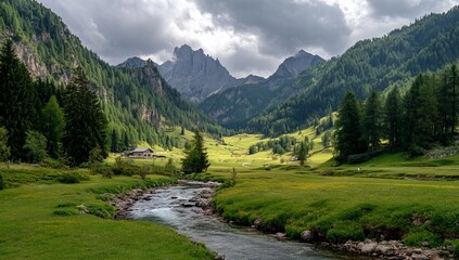 Alpine valley scene with a stream, lush greenery, and mountains