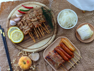 Moo Ping (Thai grilled pork skewers) — a beloved Thai street food made from marinated pork grilled over charcoal. Tender, juicy, and smoky, these skewers are commonly served with sticky rice for a fla