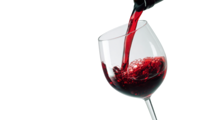 A glass fills with rich red wine, showcasing vivid colors and dynamic bubbles as it cascades.