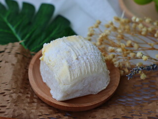 Buttered bread — soft, warm bread slices generously spread with creamy butter, perfect for breakfast or a simple snack.