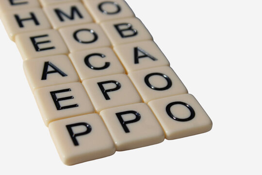 Closeup of several health insurance or healthcare acronyms on letter tiles with white space. Making sense of common terms. Business or human resources design element.