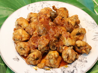 Stir-fried chicken with barbecue sauce — tender chicken pieces cooked in a sweet and smoky BBQ sauce, perfect for a flavorful and quick meal.