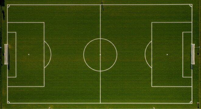 Overhead perspective of a soccer field showcases clean lines and green spaces perfect for background