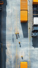 Workers walking in shipping yard

