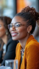 Black Business Month. Inclusive portrait of a diverse and happy team of Black businesswomen listening and smiling in a business marketing strategy meeting in a DEI workplace, Generative AI