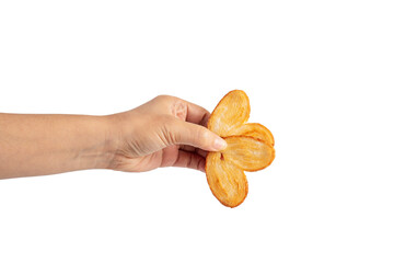 Heart shaped sugared crackers in hand on transparent background